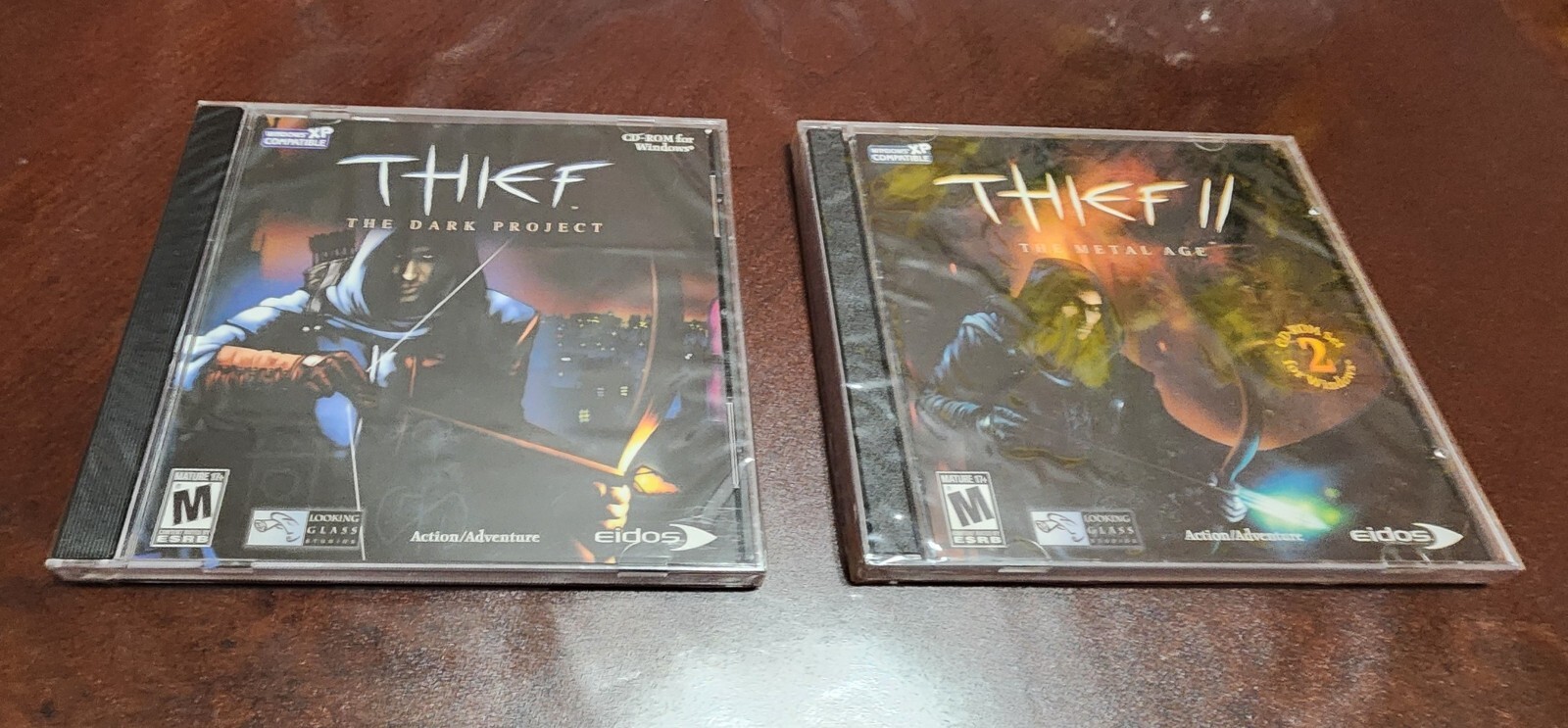 Lot of 2 Thief The Dark Project and Thief II The Metal Age eidos