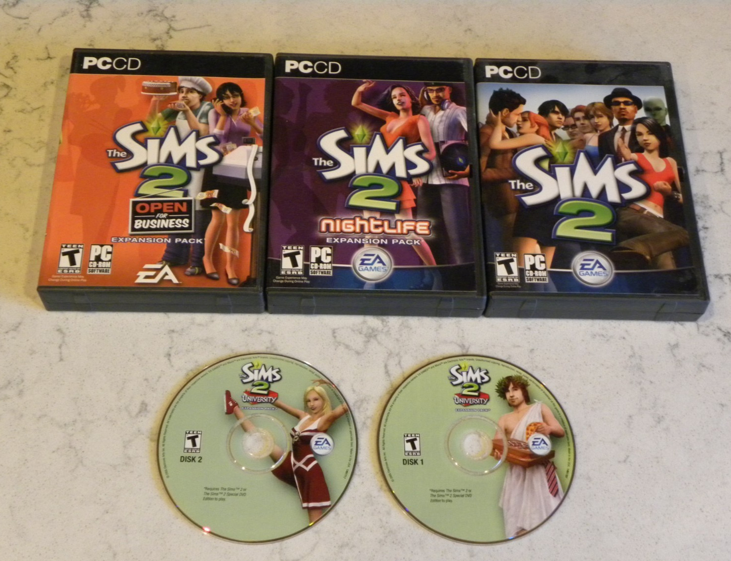 The Sims 2 + Nightlife, University & Open for Business Expansion Packs PC Bundle