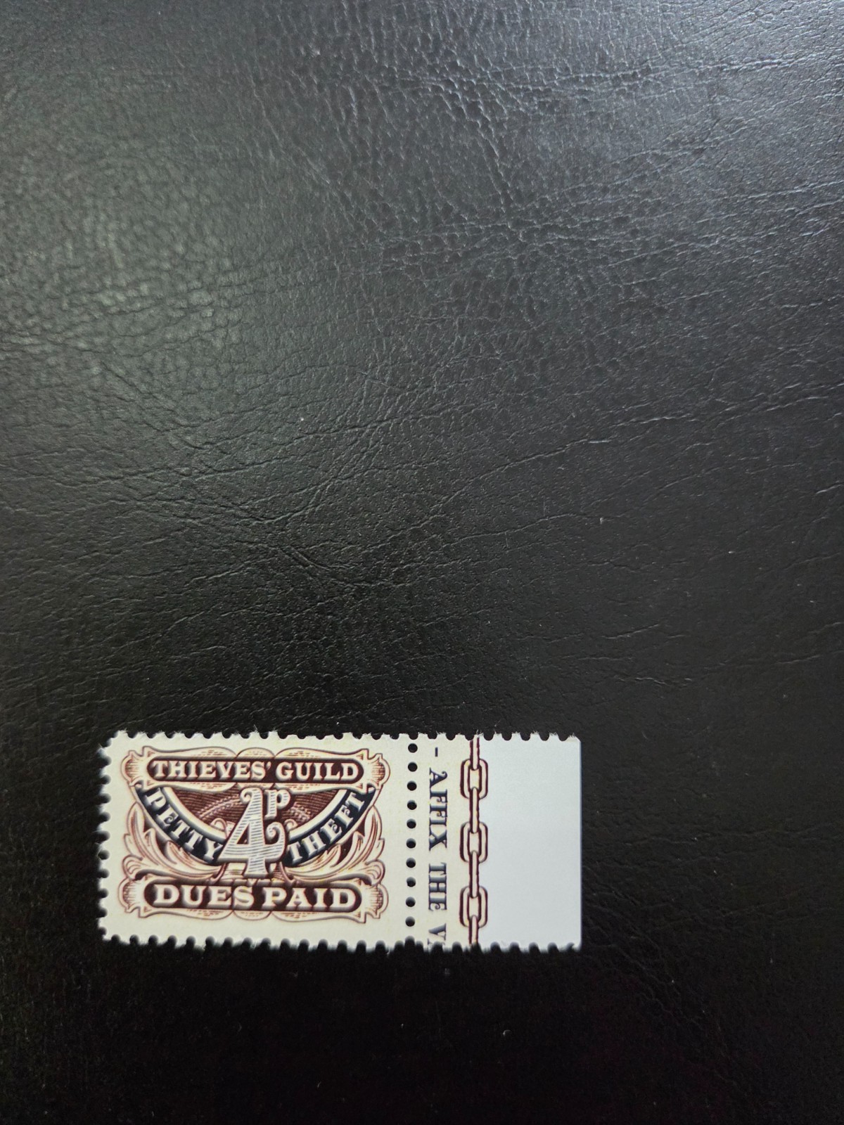 DISCWORLD Stamp Paid