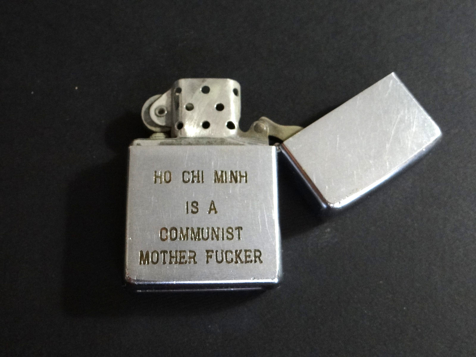 Vintage Vietnam War Zippo Lighter Engraved HO CHI MINH IS A COMMUNIST M.. F..