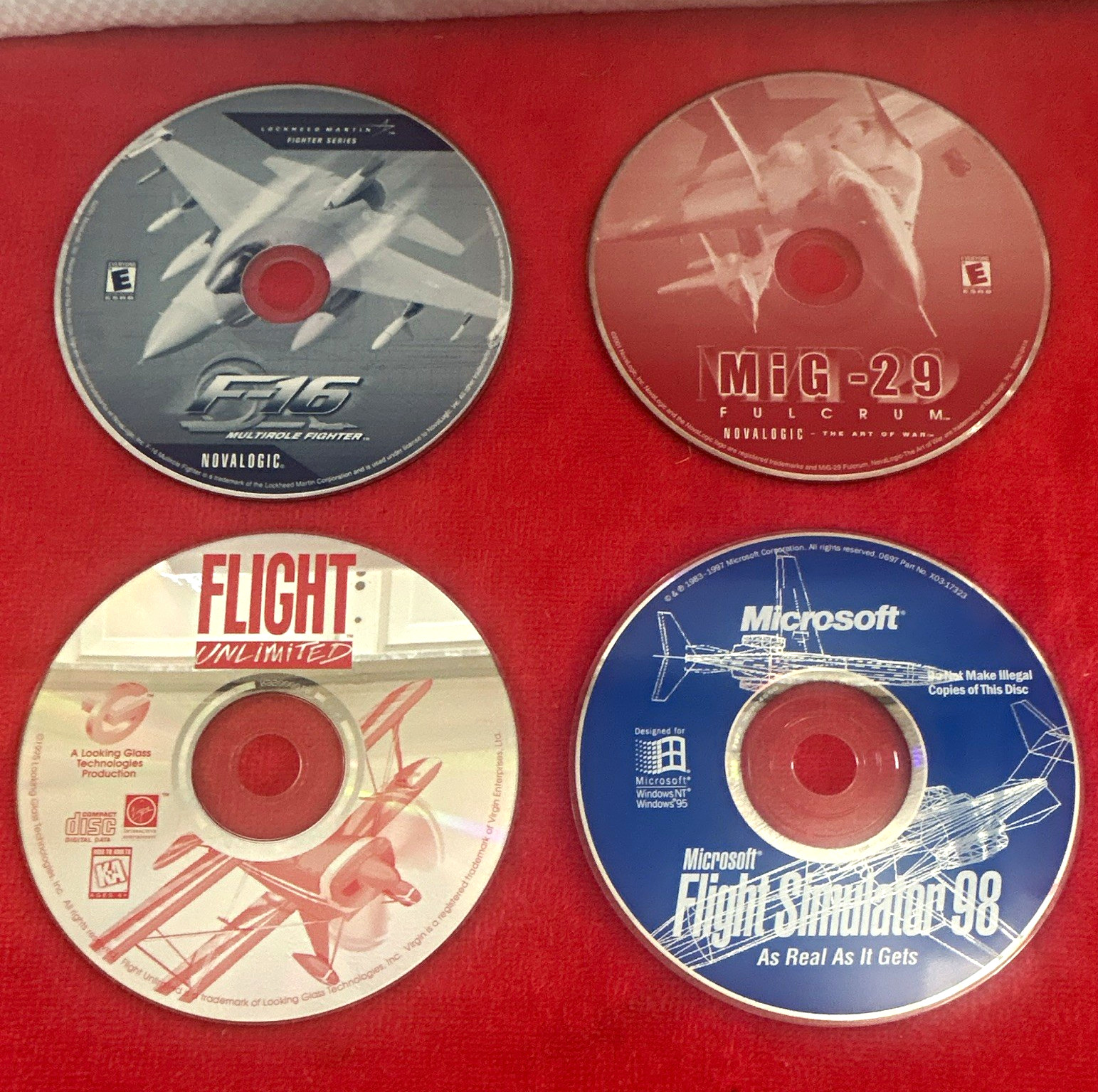 Lot of 4 Windows Microsoft Flight Simulator 98, F-16, MiG-29, Flight Unlimited
