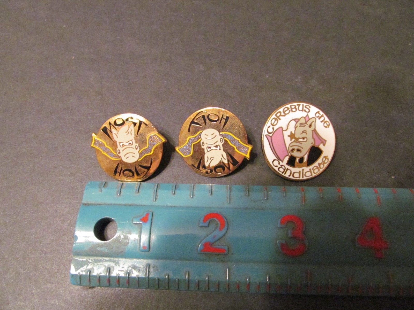 3 CEREBUS PINS, 1990s, SIM: most holy and cerebus the candidate
