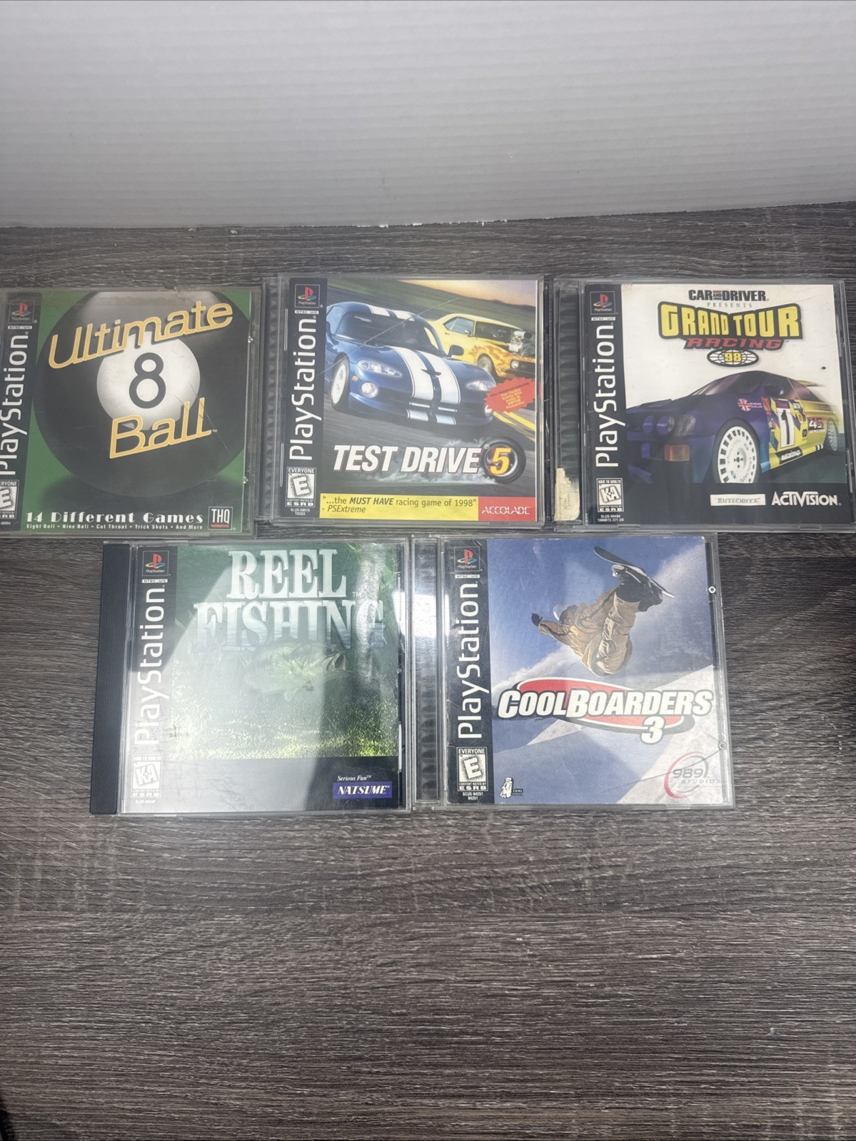 PS1 5 Game Lot Reel Fishing, Cool boarders 3, Test drive 5, Ultimate 8 Ball