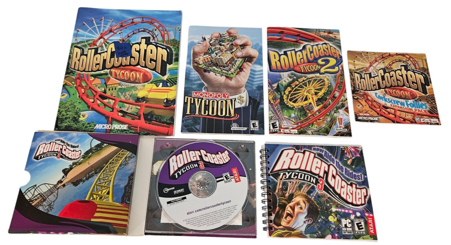 Roller Coaster Tycoon 3 PC Game & Manual With Roller Coaster 1, 2, Corkscrew