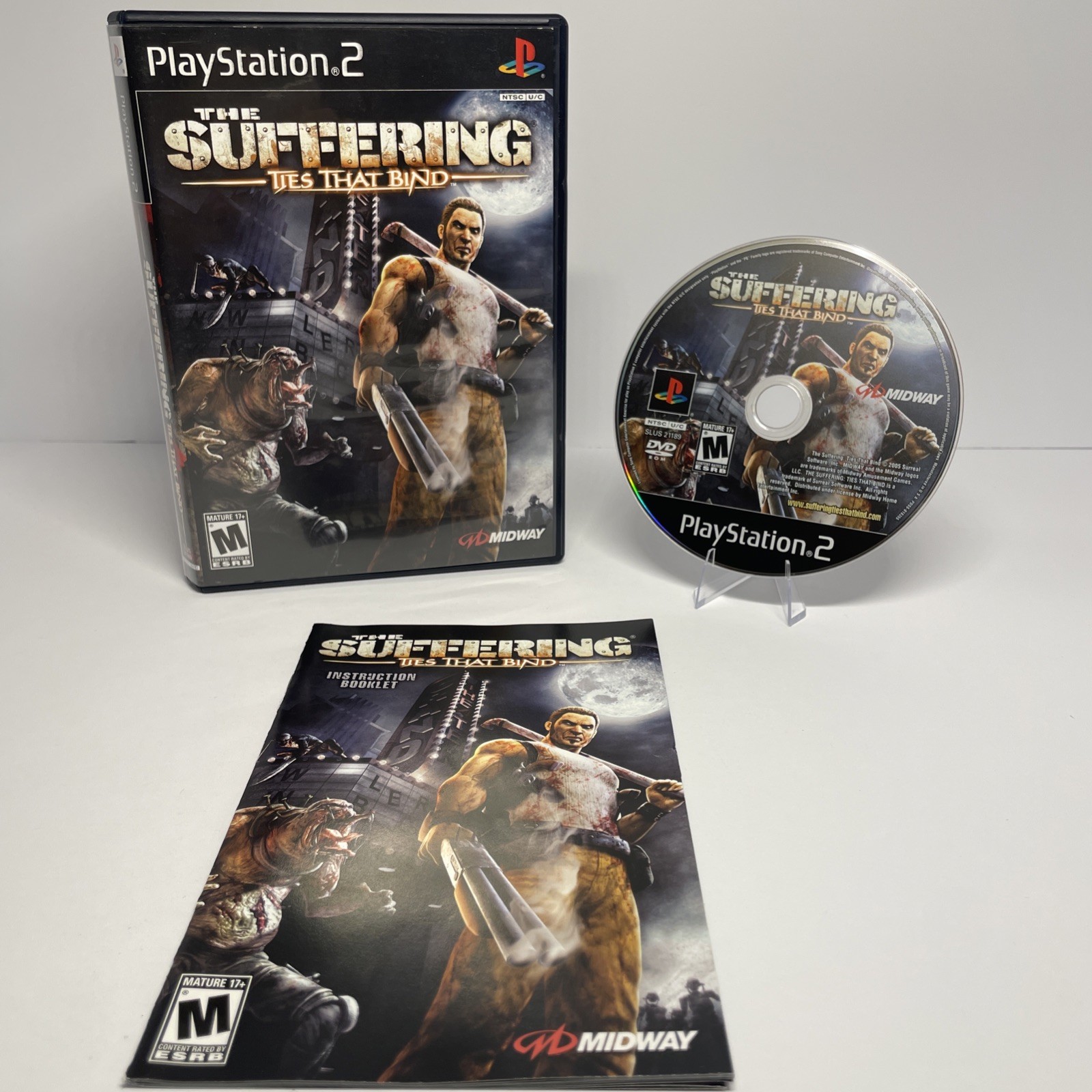 The Suffering Ties That Bind CIB includes registration card PS2