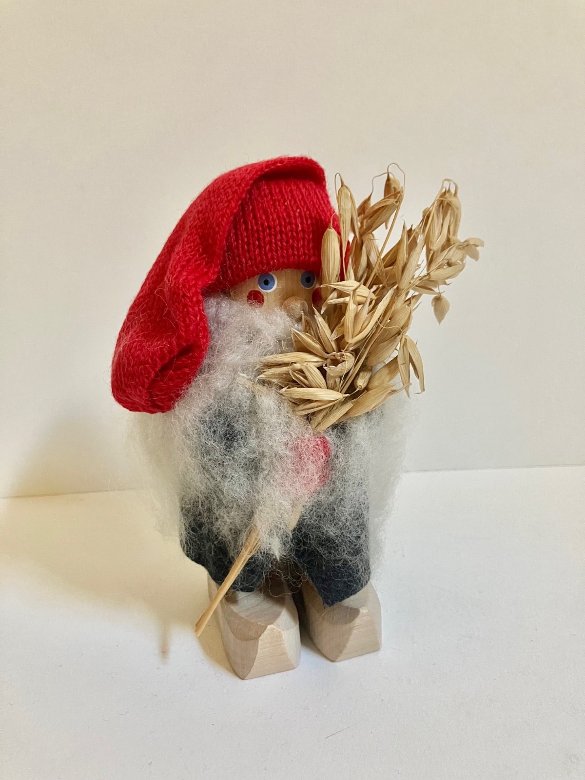 Wooly Wooden Swedish Tomte holding Oats 6.5\