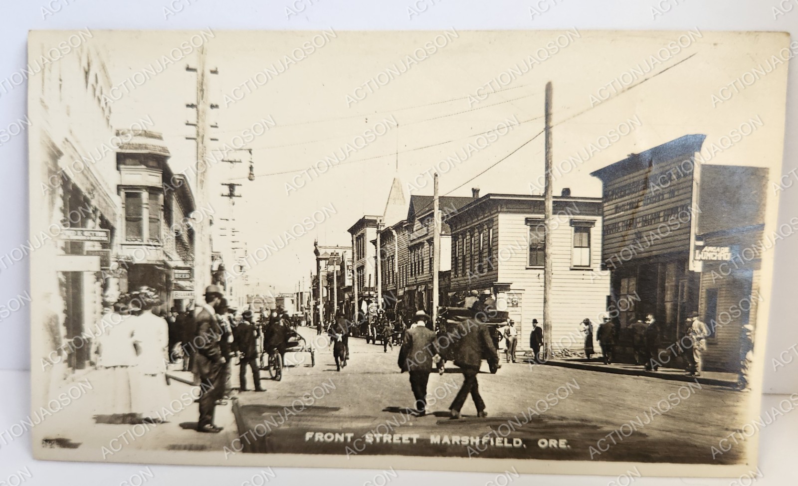 RPPC Marshfield Oregon Front Street Businesses Signs People Wagon 1911 Posted