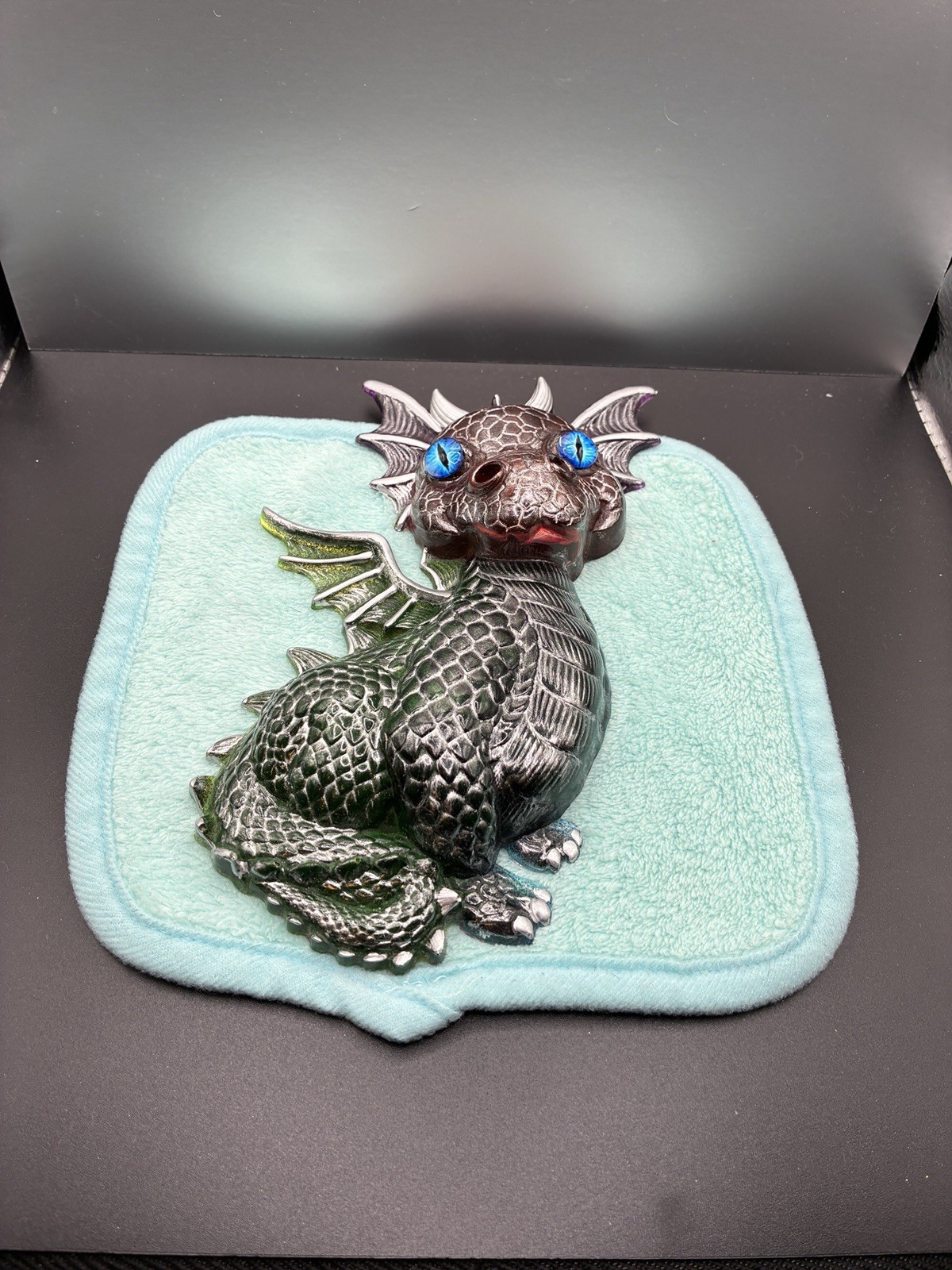 Blue-Eyed grey dinosaur decorated for a fun look