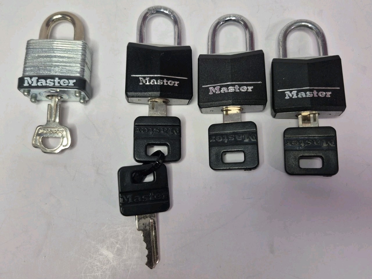 Master Lock Vinyl Covered Solid Body Padlocks: 4-  2 Are Keyed Alike, 