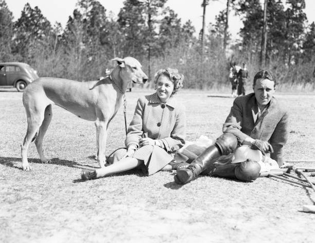 Lieutenant Mrs Raymond Firestone sit a lawn a Great Dane polo equi- Old Photo