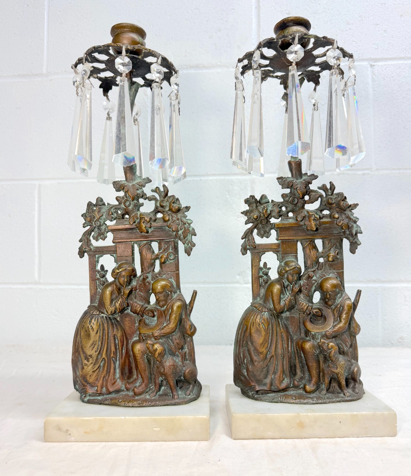 Pair of antique ornate figural bronze marble crystal girandole candle holders