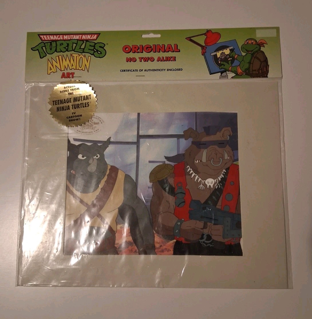 TMNT animation Cel TMNT Bebop Rocksteady Production Cel with MWS Seal and COA
