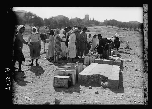 Photo:Jerusalem Palestine 1930s Crowds at Water Stand in Cityscape