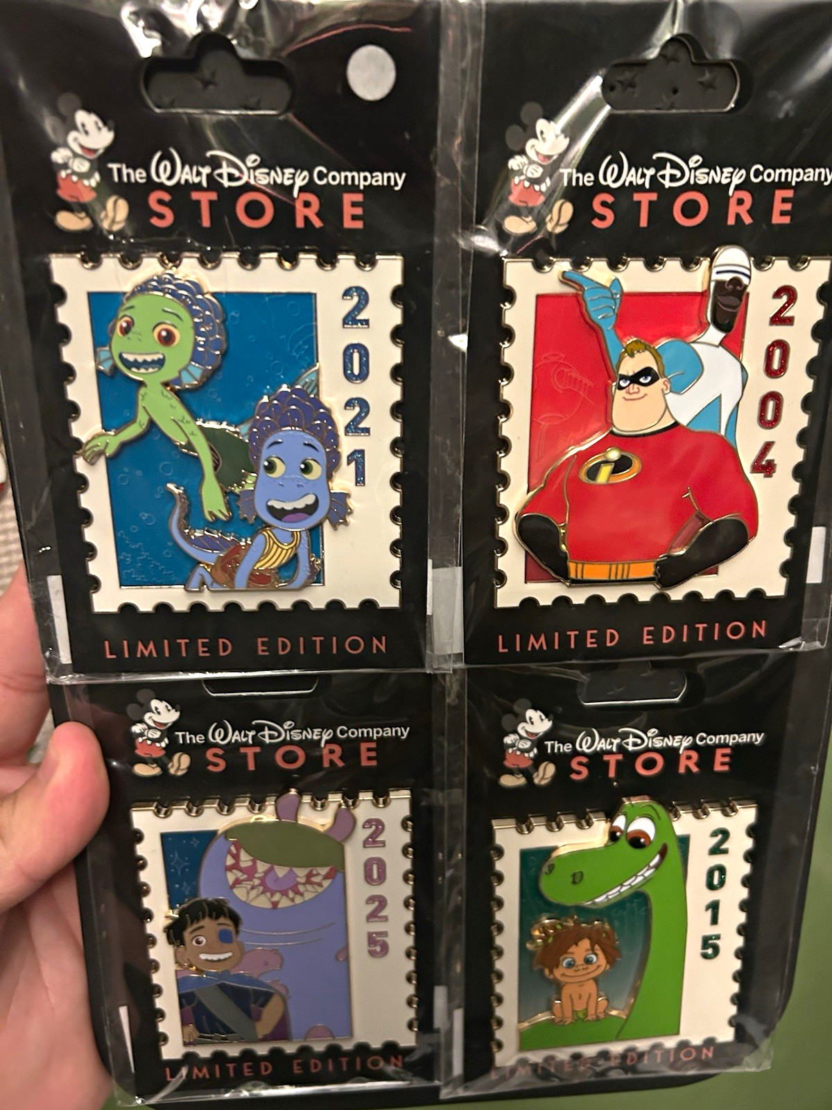 The Walt Disney Company Store Limited Edition Disney Character Pins Set stamps
