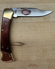 RARE BUCK 110 AMERICAN FLAG CUTOUT KNIFE NEVER USED 199/250 picture
