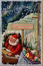 Santa Claus at  North Pole with Toys ~Antique Embossed ~Christmas Postcard~s544 picture
