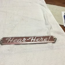 Very Nice Vintage HEAR-HERE Noisy Public Telephone Metal Sign - Alum. 12”x 2” picture