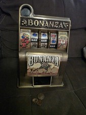 Vintage Radica Buckaroo Toy Bank Slot Machine picture