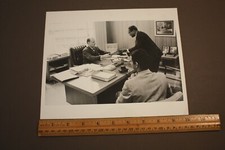 VTG B&W PHOTOGRAPH AFRICAN AMERICAN & WHITE MAN HANDING PLAQUE BEHIND DESK picture