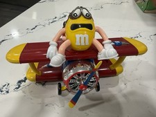 M&M World-Red & Yellow M&M Barnstorming Rides Bi Plane Airplane Candy Dispenser picture