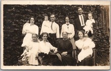 Vintage 1910s Real Photo RPPC Postcard Large Family Group Posing in Backyard picture