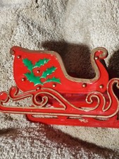 Vintage 1960s Collapsible Red Plastic Christmas Sleigh w/ Holly Leaf Decoration picture