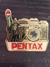 Pentax Camera Statue of Liberty Lapel Pin 1984 Souvenir Christmas Hat Pin picture
