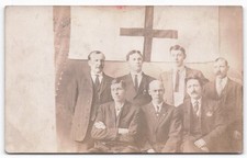 RPPC Edwardian WWI Era Men Group Portrait Red Cross Flag Type Symbol Postcard picture