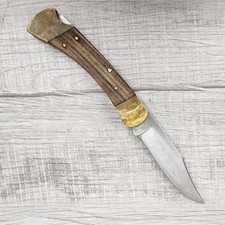 Vintage Buck 110 Folding Hunter Lockback Pocket Knife USA Dymondwood Brass picture