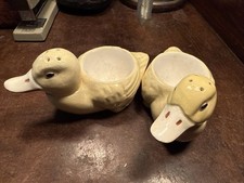 vintage yellow ceramic duck egg cups with salt shaker heads picture