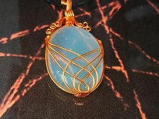 Pendant filled with super power of djinn genie to fulfill your every wish wealth picture