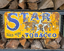 This is an absolutely unique, antique 1920s-1930s Star Tobacco advertising sign picture