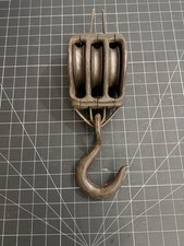 Antique Cast Iron triple pulley block with an attached iron hook picture