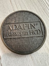 VINTAGE ADVERTISING MEDALLION BRASS MEDICATION ADAPIN DOXEPIN HC1 picture