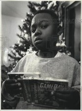 1997 Press Photo Rashad Smith missing his Sony Playstation stolen by his mother picture