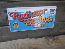 Disney CARS RADIATOR SPRINGS LICENSE PLATE Metal Sign MATER Lightning McQueen picture