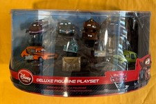 Disney Cars 2 Deluxe 7 Figurine Play Set Mater Finn NEW SEALED Ships FREE in USA picture