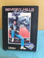 BEVERLY HILLS COP CASSETTE FOR COMMODORE 64 CBM 64 ENGLISH ITALIAN year 1990 picture