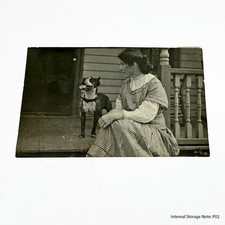 RPPC Woman & Brindle Pit Bull Type Dog on Porch Vintage Postcard 1900's picture