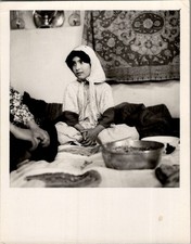~1950s Photograph Girl Seated at a Floor Meal, Suggests Iran picture