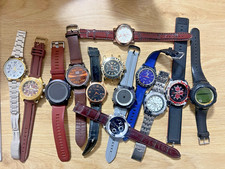 A collection of clocks, some of which work and some of which do not. picture