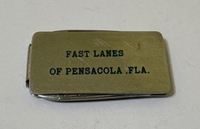 Vintage Fast Lanes of Pensacola Florida Advertising Waltcraft Money Clip / Knife picture