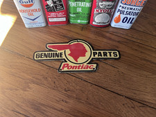 NICE PONTIAC GENUINE PARTS INDIAN HEAD PORCELAIN SIGN picture