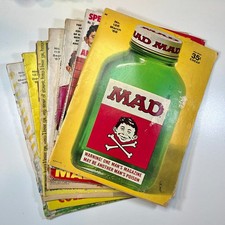 Up for sale is a fantastic instant collection of 7 vintage MAD Magazines dating picture