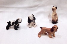 Lot of 4 Vintage Hagen Renaker 3 Miniature Dogs and 1 Cat picture
