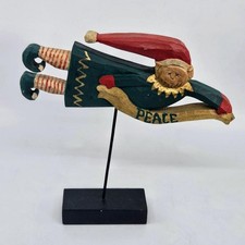 Vtg Mann Primitive Carved Wood Flying Elf Figurine Gold Metallic Peace Banner picture