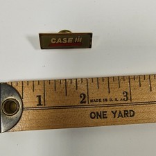 Promotional lapel pin for Case IH agricultural equipment. picture