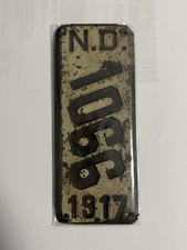 NORTH DAKOTA Motorcycle LICENSE PLATE 1917 steel SLANTED NUMBERS vertical  picture