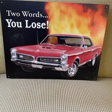 Desperate Enterprises Pontiac GTO Reproduction Metal Sign Red Black Orange picture
