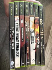Lot Of 7 XBOX Games Battle Fight Night Star Wars Warpath Medal Tetris True Crime picture